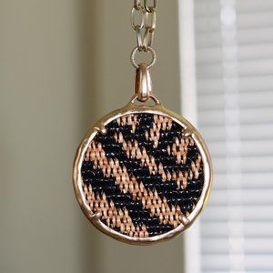 PATRICIA NASH. ANTIQUE GOLD NECKLACE LARGE CIRCLE PENNANT W/BLACK & LITE BROWN